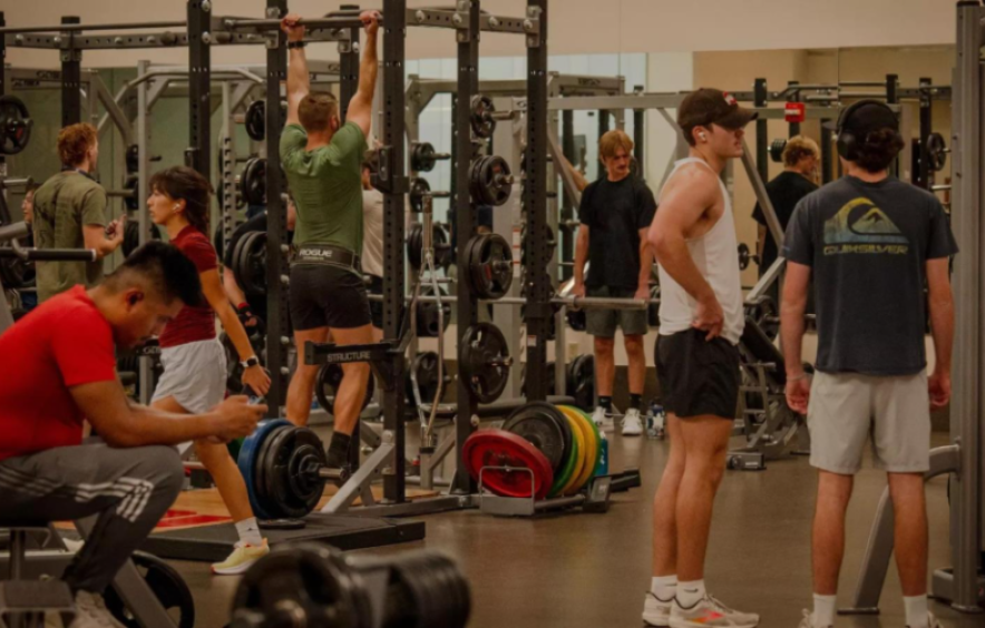students in weight room at rec center