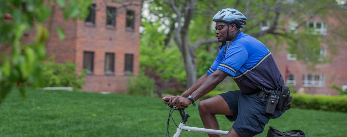 campus safety officer on bicycle