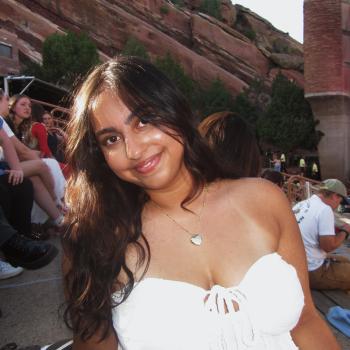 Photo of a woman in a white dress