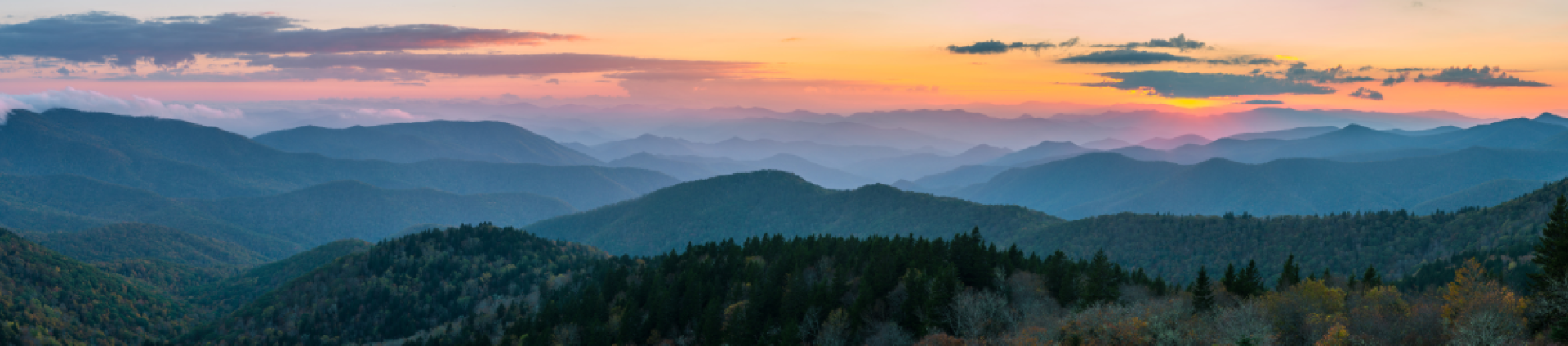 sunrise over low mountains